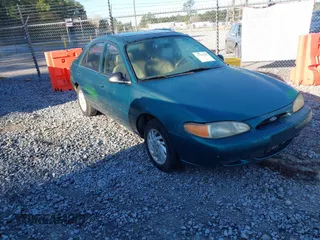 1998 Ford Escort SE with VIN 1FAFP13P5WW206804, listed as a IAAI auction lot 41759354 with 158,749 mi miles. Bid and sale history available at carsss.com. Image 1.