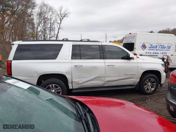 2016 Chevrolet Suburban LT with VIN 1GNSKHKC2GR182080, listed as a IAAI auction lot 41666445 with 148,661 mi miles. Bid and sale history available at carsss.com. Image 13.