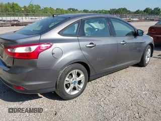 2013 Ford Focus SE with VIN 1FADP3F24DL269491, listed as a IAAI auction lot 42693397 with 304,906 mi miles and . Bid and sale history available at DreamBid. Image 4.