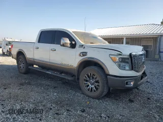 2016 Nissan Titan XD Platinum Reserve with VIN 1N6BA1F47GN510930, listed as a Copart auction lot 82561154 with 146,989 mi miles and Salvage Title. Bid and sale history available at carsss.com. Image 4.