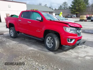 2017 Chevrolet Colorado 4WD LT with VIN 1GCGTCENXH1148173, listed as a IAAI auction lot 41822557 with 106,960 mi miles and . Bid and sale history available at DreamBid. Image 1.