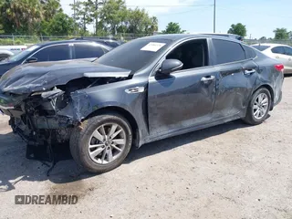 2017 Kia Optima LX with VIN 5XXGT4L30HG157122, listed as a IAAI auction lot 42084378 with 175,215 mi miles. Bid and sale history available at carsss.com. Image 2.