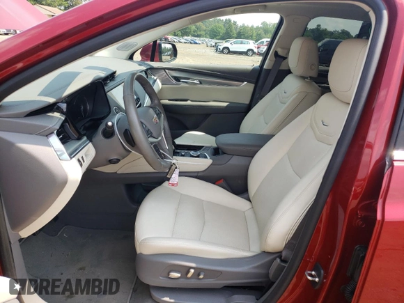 2023 Cadillac XT5 FWD Premium Luxury with VIN 1GYKNCR44PZ169259, listed as a Copart auction lot 66371794 with 13,319 mi miles and Salvage Title. Bid and sale history available at carsss.com. Image 7.