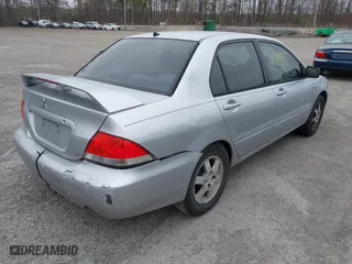 2004 Mitsubishi Lancer LS with VIN JA3AJ36E44U020349, listed as a IAAI auction lot 41714325 with 1 mi miles. Bid and sale history available at carsss.com. Image 4.