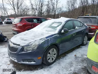 2014 Chevrolet Cruze LS with VIN 1G1PB5SG7E7142059, listed as a IAAI auction lot 41435050 with 106,067 mi miles. Bid and sale history available at carsss.com. Image 2.