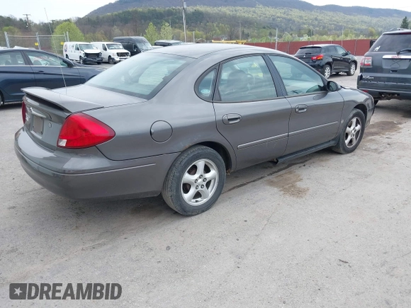 2003 Ford Taurus SES Standard with VIN 1FAFP55S63G176291, listed as a IAAI auction lot 42079514 with 173,623 mi miles. Bid and sale history available at carsss.com. Image 4.