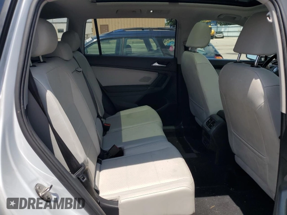 2018 Volkswagen Tiguan SEL z VIN 3VV2B7AX7JM126444, wystawiony jako Copart lot #61574485 z przebiegiem 86 720 mil mil oraz Szkoda całkowita • Salvage title. Historia ofert i sprzedaży dostępna na DreamBid. Obrazek 11.