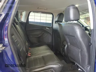 2013 Ford Escape SEL z VIN 1FMCU9HX7DUC87287, wystawiony jako Copart lot #61798475 z przebiegiem 147 521 mil mil oraz Czysty tytuł • Clean title. Historia ofert i sprzedaży dostępna na DreamBid. Obrazek 11.