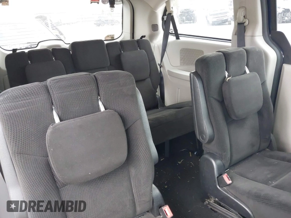 2016 Dodge Grand Caravan SE with VIN 2C4RDGBG4GR146450, listed as a IAAI auction lot 42015145 with 128,725 mi miles. Bid and sale history available at carsss.com. Image 8.
