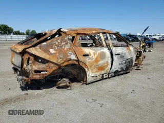 2024 Kia EV6 Wind with VIN KNDC34LA4R5185136, listed as a Copart auction lot 48872365 with Not Provided miles and Non Repairable. Bid and sale history available at DreamBid. Image 3.