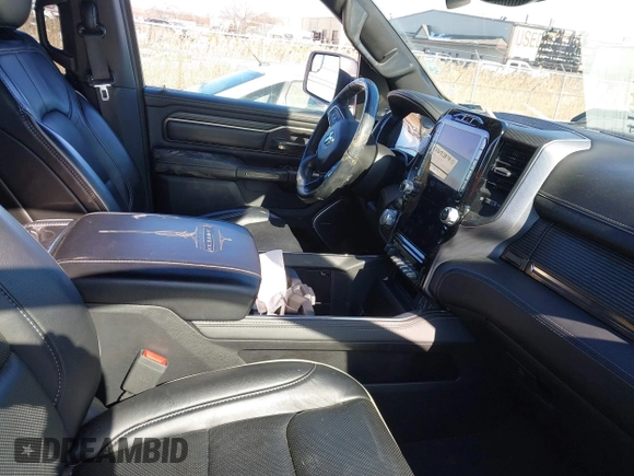 2021 Ram 1500 Limited with VIN 1C6SRFHT5MN548477, listed as a IAAI auction lot 41644894 with 51,429 mi miles and . Bid and sale history available at DreamBid. Image 5.
