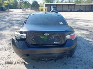 2015 Scion FR-S with VIN JF1ZNAA10F8707671, listed as a IAAI auction lot 42000130 with 136,734 mi miles. Bid and sale history available at carsss.com. Image 16.
