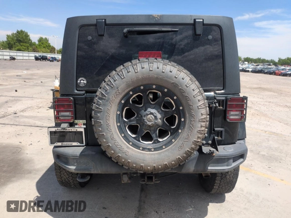 2012 Jeep Wrangler Unlimited Sahara z VIN 1C4HJWEG1CL168435, wystawiony jako Copart lot #58431615 z przebiegiem 120 364 mil mil oraz Szkoda całkowita • Salvage title. Historia ofert i sprzedaży dostępna na DreamBid. Obrazek 6.