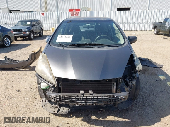 2013 Honda Fit with VIN JHMGE8H37DC048529, listed as a IAAI auction lot 42011202 with 255,113 mi miles. Bid and sale history available at carsss.com. Image 13.