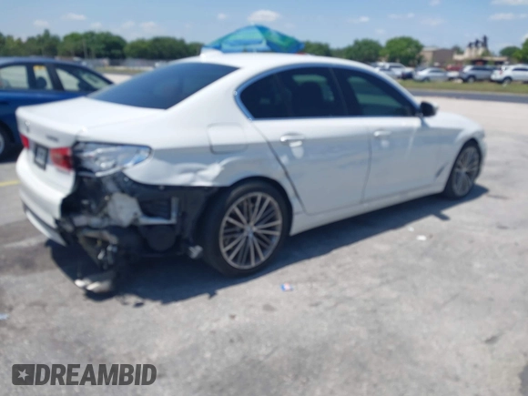 2018 BMW 5 Series 540i с VIN WBAJE5C5XJWA96101, выставлен на аукционе IAAI как лот 42268201 с пробегом 111 626 миль миль и . История ставок и продаж доступна на DreamBid. Изображение 4.