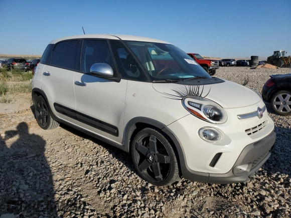 2014 FIAT 500L Trekking with VIN ZFBCFADH6EZ011642, listed as a Copart auction lot 71474774 with 104,327 mi miles and Salvage Title. Bid and sale history available at carsss.com. Image 4.