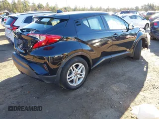 2021 Toyota C-HR LE with VIN NMTKHMBXXMR123633, listed as a IAAI auction lot 40787336 with 28,234 mi miles. Bid and sale history available at carsss.com. Image 4.
