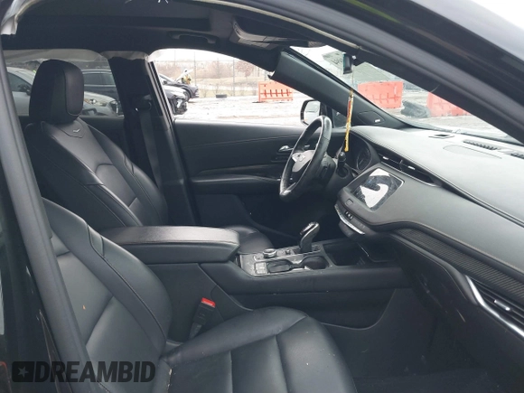 2021 Cadillac XT4 AWD Sport with VIN 1GYFZFR49MF065225, listed as a IAAI auction lot 41191994 with 58,095 mi miles and . Bid and sale history available at DreamBid. Image 5.