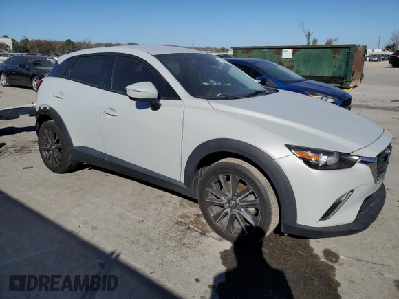 2018 Mazda CX-3 Touring with VIN JM1DKDC77J0305749, listed as a Copart auction lot 86524474 with 112,562 mi miles and Salvage Title. Bid and sale history available at DreamBid. Image 4.