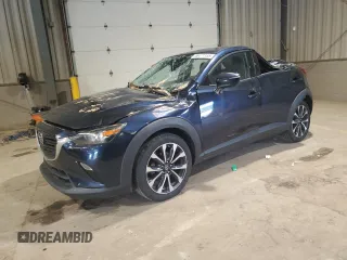 2019 Mazda CX-3 Touring z VIN JM1DKFC72K1409055, wystawiony jako Copart lot #56471155 z przebiegiem 95 168 mil mil oraz Szkoda całkowita • Salvage title. Historia ofert i sprzedaży dostępna na DreamBid. Obrazek 1.