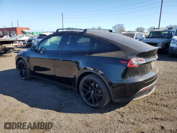 2022 Tesla Model Y Long Range z VIN 7SAYGDEE2NF391349, wystawiony jako Copart lot #85351924 z przebiegiem 5 670 mil mil oraz Szkoda całkowita • Salvage title. Historia ofert i sprzedaży dostępna na DreamBid. Obrazek 2.