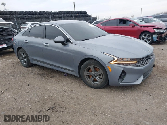 2021 Kia K5 LXS with VIN 5XXG14J24MG015799, listed as a IAAI auction lot 41704156 with 72,359 mi miles. Bid and sale history available at carsss.com. Image 1.
