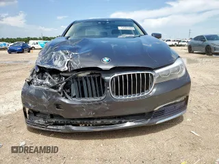 2016 BMW 7 Series 740i with VIN WBA7E2C57GG714564, listed as a Copart auction lot 64005965 with 111,598 mi miles and Salvage title. Bid and sale history available at DreamBid. Image 5.