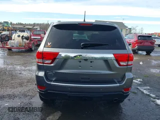 2013 Jeep Grand Cherokee Overland with VIN 1C4RJFCG8DC581719, listed as a IAAI auction lot 41566666 with 152,332 mi miles. Bid and sale history available at carsss.com. Image 16.