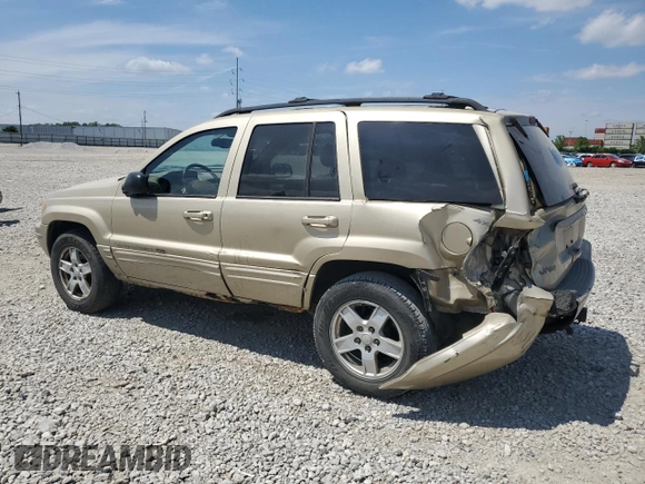 2000 Jeep Grand Cherokee Limited z VIN 1J4GW58N0YC272532, wystawiony jako Copart lot #57524225 z przebiegiem 238 921 mil mil oraz Szkoda całkowita • Salvage title. Historia ofert i sprzedaży dostępna na DreamBid. Obrazek 2.