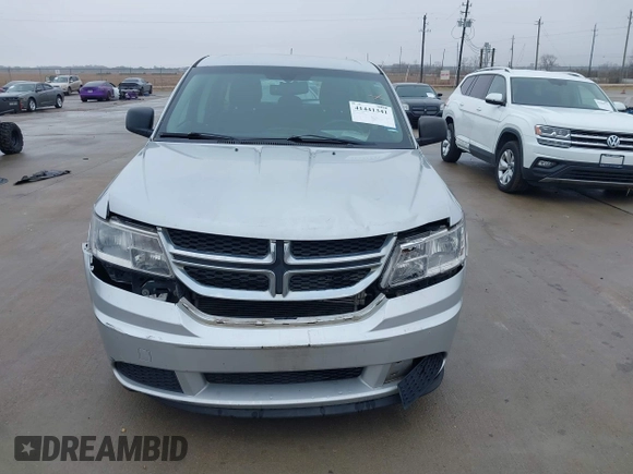 2014 Dodge Journey SE Plus with VIN 3C4PDCAB1ET181480, listed as a IAAI auction lot 41441341 with 189,641 mi miles and . Bid and sale history available at DreamBid. Image 6.