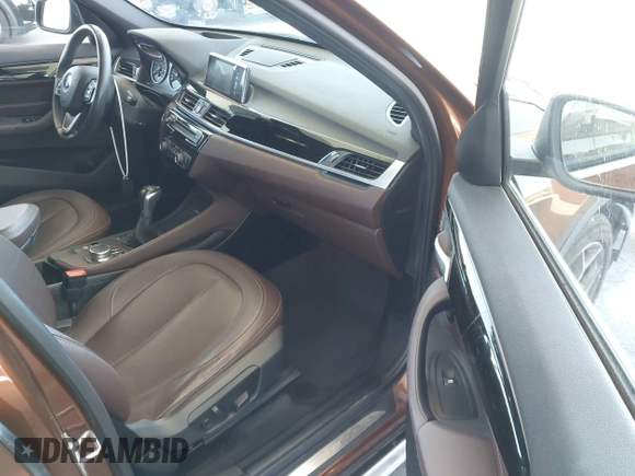 2017 BMW X1 xDrive28i with VIN WBXHT3C34H5F75885, listed as a IAAI auction lot 42655580 with 54,609 mi miles and . Bid and sale history available at DreamBid. Image 5.