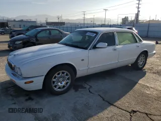 2001 Jaguar XJ with VIN SAJDA23C51LF35586, listed as a Copart auction lot 44105165 with 47,355 mi miles and Salvage title. Bid and sale history available at DreamBid. Image 1.