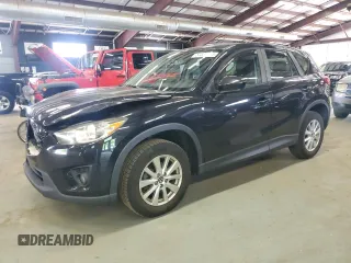 2014 Mazda CX-5 Sport z VIN JM3KE2BE0E0367493, wystawiony jako Copart lot #57324195 z przebiegiem 103 367 mil mil oraz Szkoda całkowita • Salvage title. Historia ofert i sprzedaży dostępna na DreamBid. Obrazek 1.