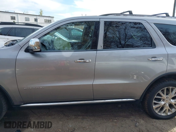 2014 Dodge Durango Citadel z VIN 1C4SDJET5EC509366, wystawiony jako IAAI lot #40735205 z przebiegiem 149 644 mil mil oraz . Historia ofert i sprzedaży dostępna na DreamBid. Obrazek 13.