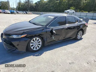 2020 Toyota Camry LE with VIN 4T1L11AK6LU999376, listed as a Copart auction lot 74192794 with 81,396 mi miles and Salvage Title. Bid and sale history available at carsss.com. Image 1.