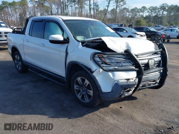 2018 Honda Ridgeline RTL-E with VIN 5FPYK3F71JB001753, listed as a IAAI auction lot 41510248 with 84,551 mi miles and . Bid and sale history available at DreamBid. Image 1.