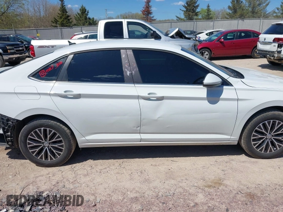 2021 Volkswagen Jetta S z VIN 3VWC57BU6MM045659, wystawiony jako IAAI lot #42201090 z przebiegiem 66 937 mil mil oraz . Historia ofert i sprzedaży dostępna na DreamBid. Obrazek 14.