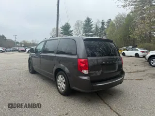 2019 Dodge Grand Caravan SE with VIN 2C4RDGBG2KR718687, listed as a Copart auction lot 55877605 with 199,604 mi miles and Clean Title. Bid and sale history available at DreamBid. Image 3.