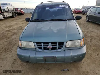 2000 Kia Sportage with VIN KNDJA7230Y5684886, listed as a Copart auction lot 81407744 with 213,749 mi miles and Clean Title. Bid and sale history available at carsss.com. Image 5.
