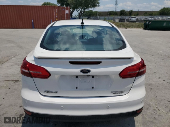2015 Ford Focus Titanium с VIN 1FADP3J24FL304136, выставлен на аукционе Copart как лот 58428865 с пробегом 81 668 миль миль и Списание • Salvage title. История ставок и продаж доступна на DreamBid. Изображение 6.