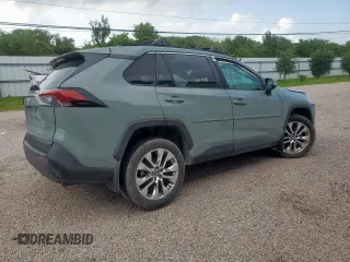 2021 Toyota RAV4 XLE Premium with VIN 2T3C1RFV7MW151789, listed as a Copart auction lot 58700795 with 105,648 mi miles and Clean title. Bid and sale history available at DreamBid. Image 3.