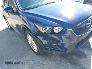 2014 Mazda CX-5 Grand Touring with VIN JM3KE2DY7E0376389, listed as a IAAI auction lot 42014946 with 126,081 mi miles. Bid and sale history available at carsss.com. Image 6.
