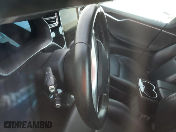 2014 Tesla Model S P85D with VIN 5YJSA1H28EFP62793, listed as a Copart auction lot 52902495 with Not Provided miles and Salvage Title. Bid and sale history available at DreamBid. Image 9.