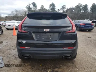 2023 Cadillac XT4 FWD Luxury with VIN 1GYAZAR45PF218684, listed as a Copart auction lot 46483515 with 74,920 mi miles and Salvage title. Bid and sale history available at DreamBid. Image 6.