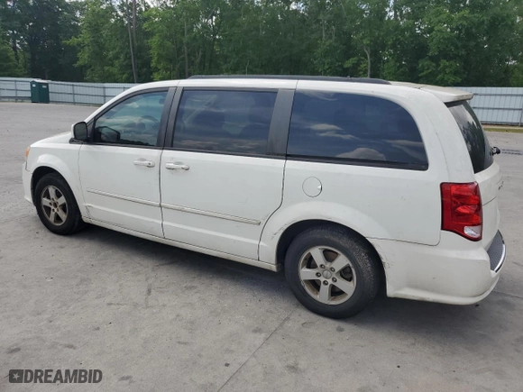 2012 Dodge Grand Caravan SXT with VIN 2C4RDGCG7CR167303, listed as a Copart auction lot 54131385 with 135,987 mi miles and Clean Title. Bid and sale history available at carsss.com. Image 2.