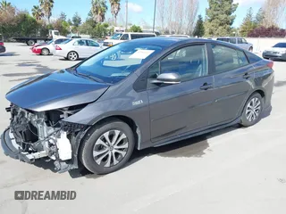 2022 Toyota Prius LE with VIN JTDKAMFP7N3206830, listed as a IAAI auction lot 41984239 with 57,681 mi miles and . Bid and sale history available at DreamBid. Image 2.