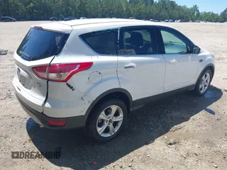 2014 Ford Escape SE with VIN 1FMCU9G90EUB76911, listed as a IAAI auction lot 42143518 with 123,466 mi miles and . Bid and sale history available at DreamBid. Image 4.