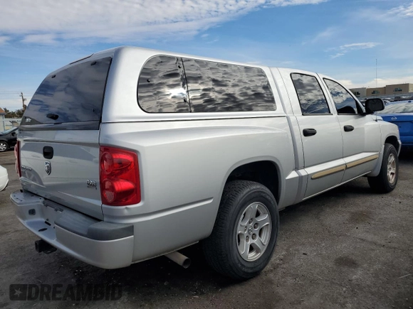 2005 Dodge Dakota SLT with VIN 1D7HE48N95S177871, listed as a Copart auction lot 46005395 with 141,978 mi miles and Clean Title. Bid and sale history available at DreamBid. Image 3.