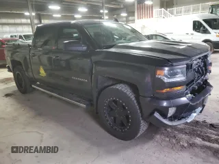 2016 Chevrolet Silverado 1500 LT with VIN 3GCUKRECXGG236034, listed as a Copart auction lot 51754255 with 205,670 mi miles and Salvage Title. Bid and sale history available at DreamBid. Image 4.
