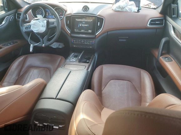 2018 Maserati Ghibli with VIN ZAM57XSA0J1286682, listed as a Copart auction lot 65457315 with 50,169 mi miles and Salvage title. Bid and sale history available at DreamBid. Image 8.